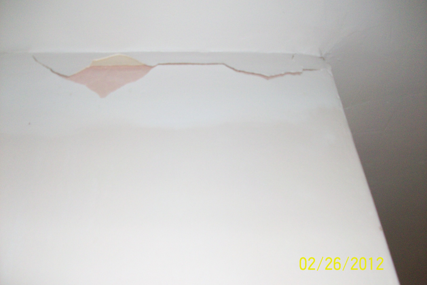 Cracks in plaster by ceiling sinkhole Orlando